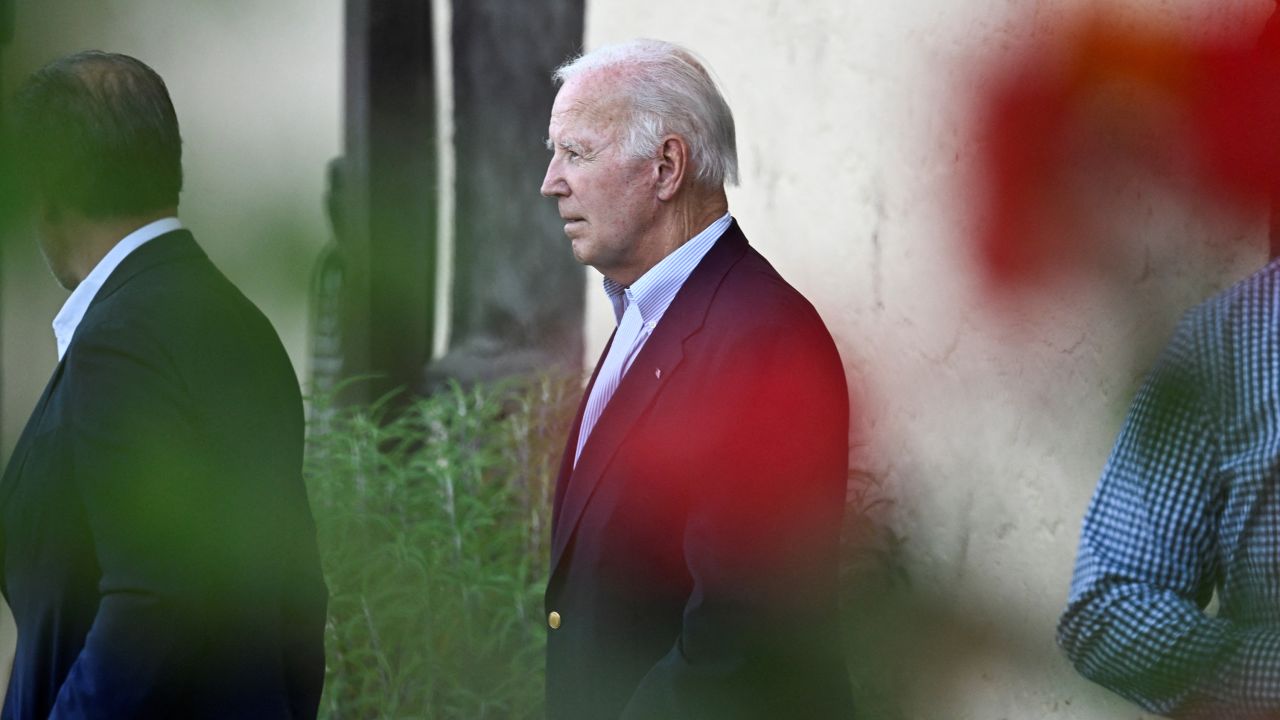 President Joe Biden and his son Hunter Biden depart a church after attending Mass in Solvang, California, on August 24.