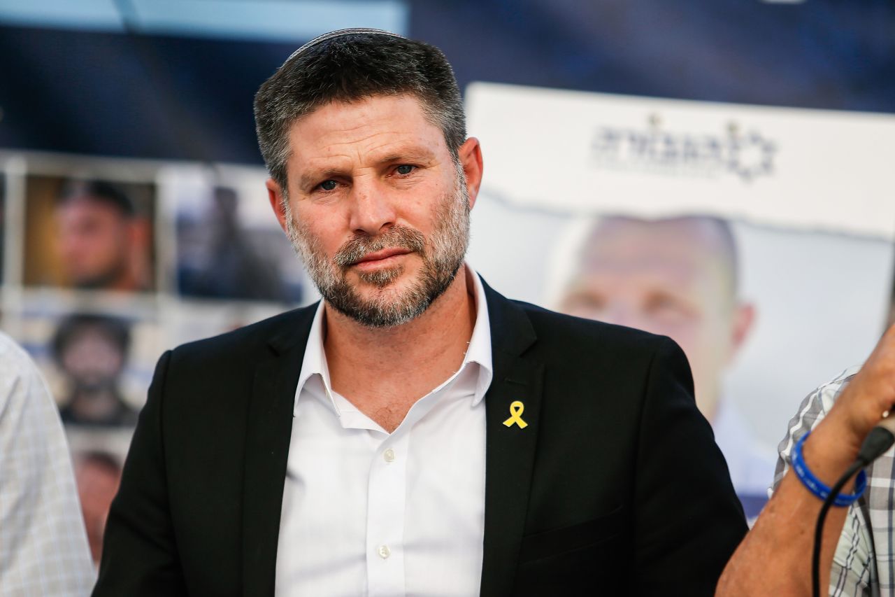 Israel's Finance Minister Bezalel Smotric addresses the relatives of Israelis being held hostage during the rally in the center of Jerusalem, on June 3.