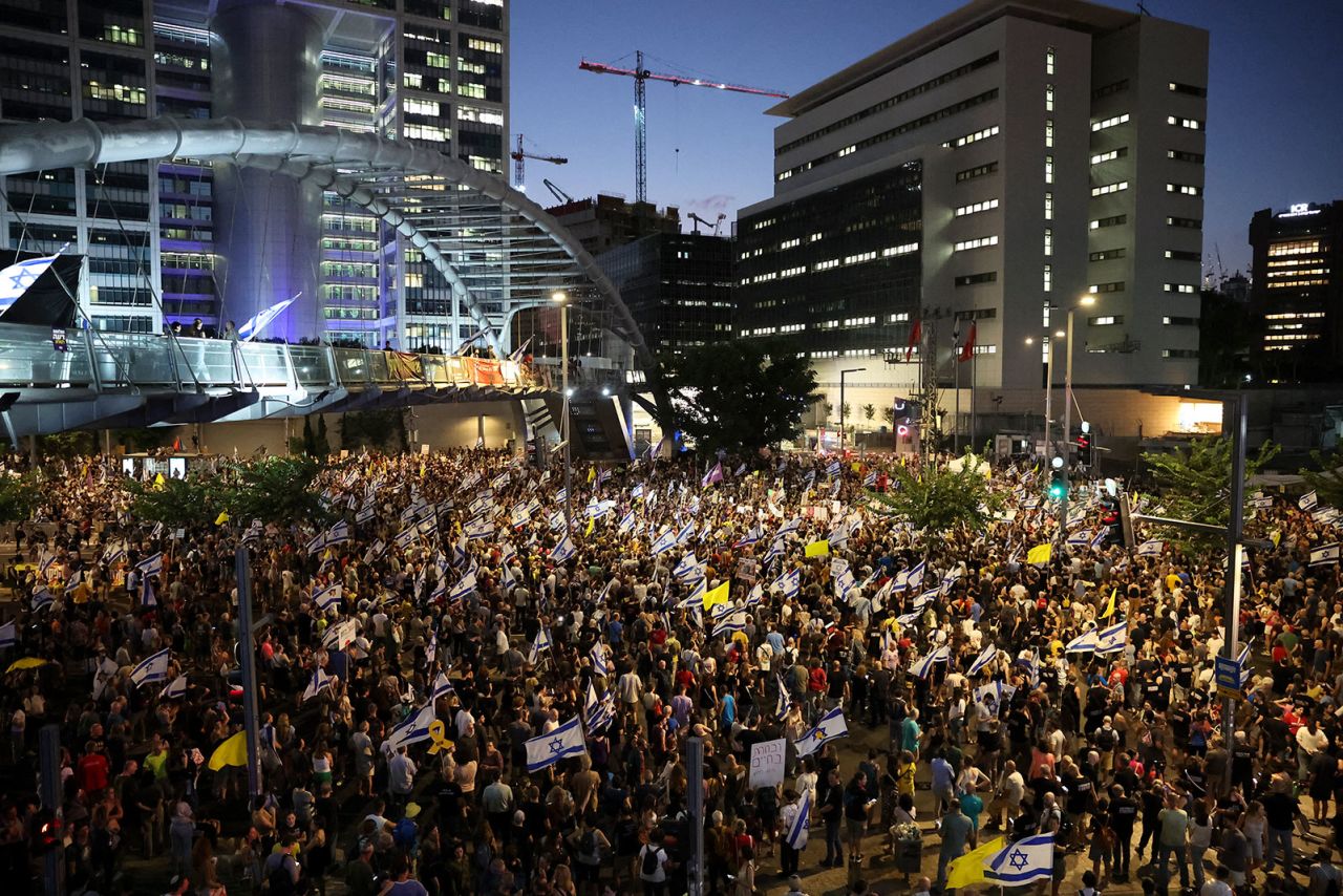 Demonstrators march during a protest in Tel Aviv calling for action to secure the release of Israeli hostages on September 2.