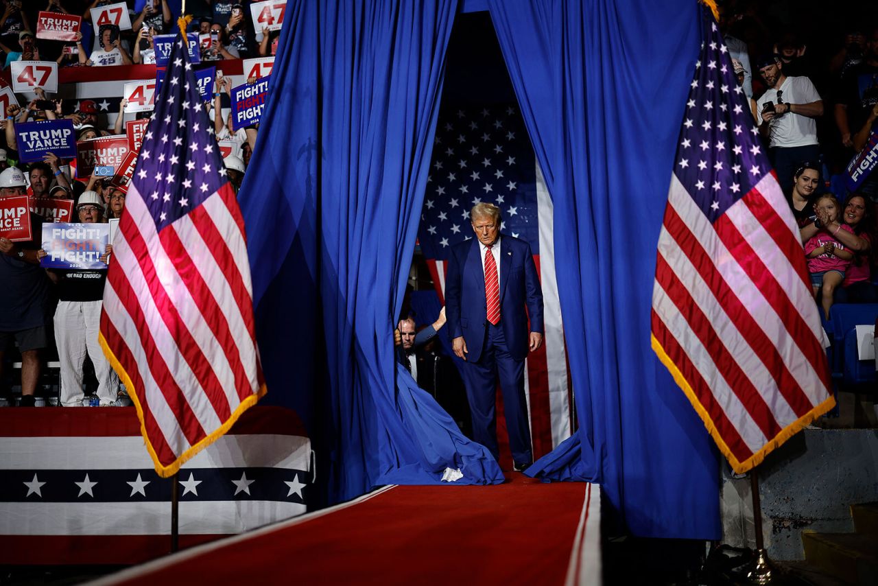 Former President Donald Trump takes the stage during a campaign rally in the 1st Summit Arena at the Cambria County War Memorial on August 30 in Johnstown, Pennsylvania.