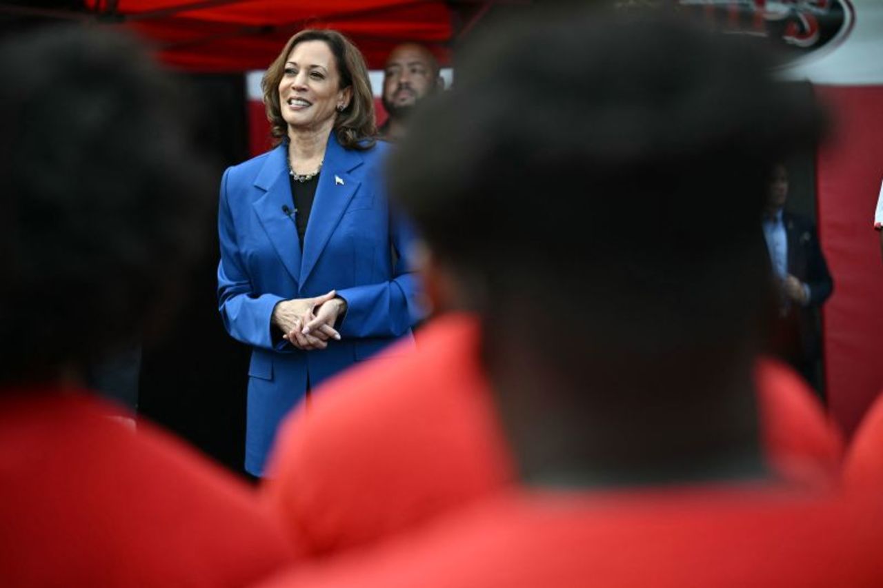 Vice President Kamala Harris speaks to the Aliquippa High School football team during a stop on her campaign bus tour in Aliquippa, Pennsylvania, on August 18, 2024. 