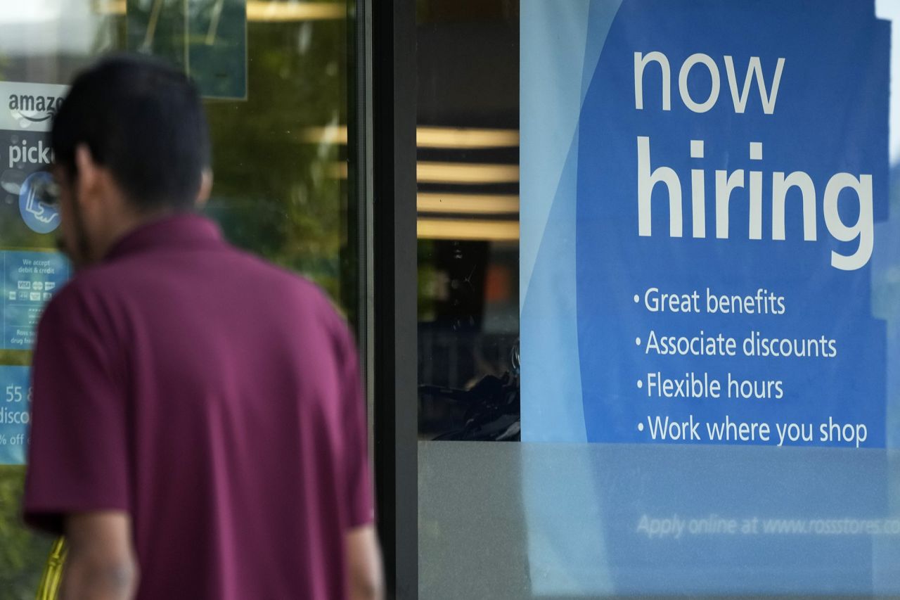 A hiring sign is displayed at a retail store in Schaumburg, Illinois, on July 10.