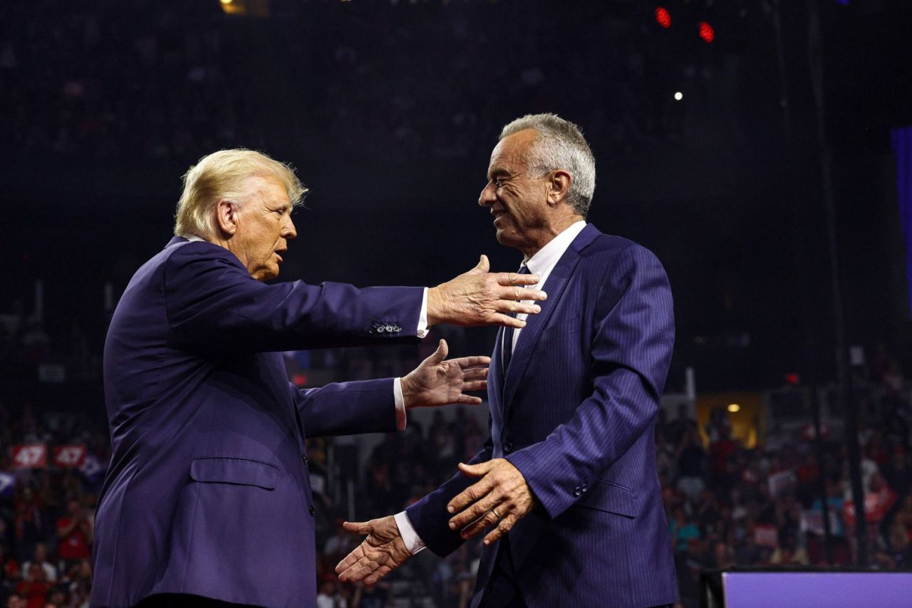 Former President Donald Trump, left, greets Robert F. Kennedy Jr., at a campaign rally in Glendale, Arizona, on August 23. Kennedy had just suspended his independent campaign and threw his support behind Trump. 