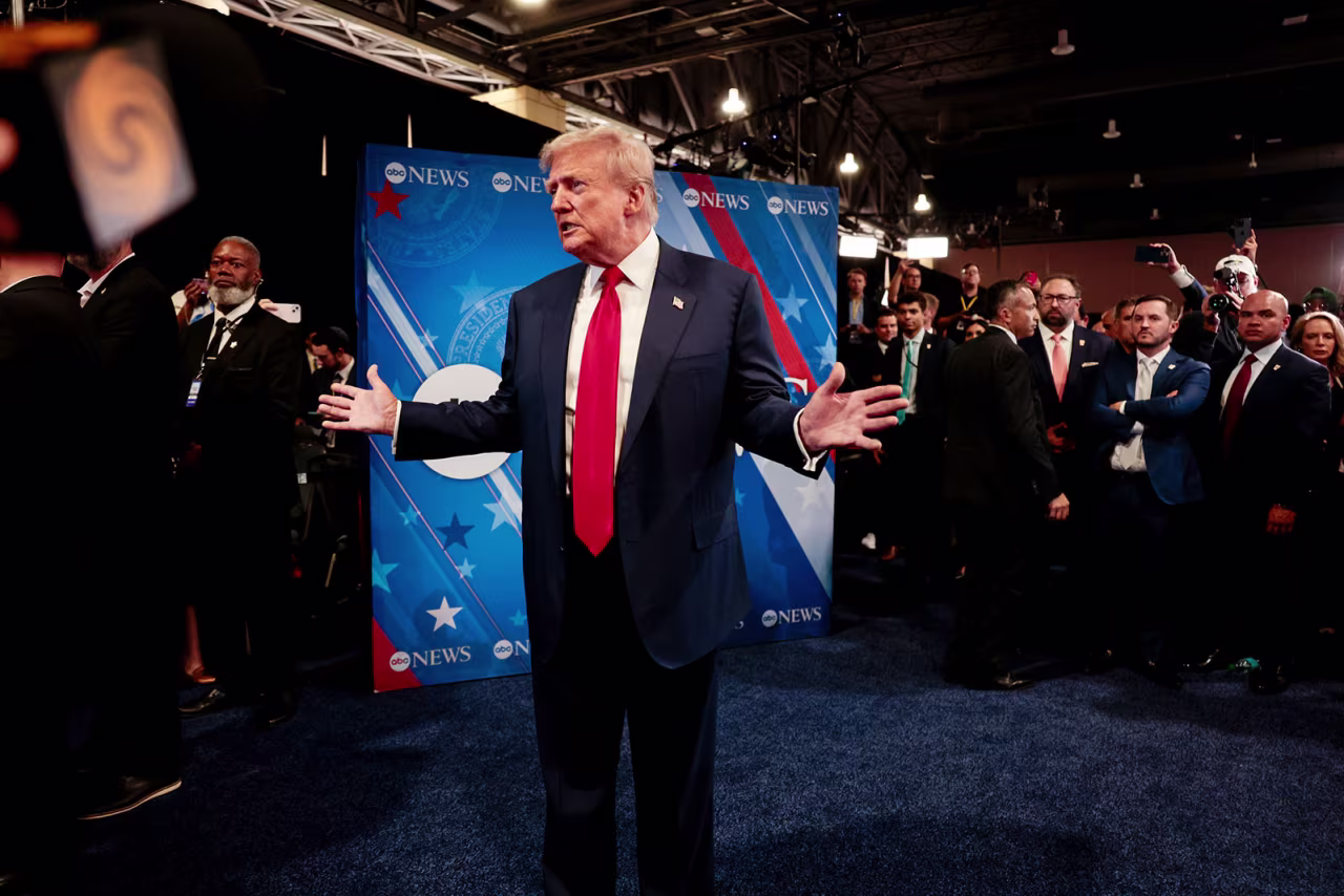 Former President Donald Trump speaks to members of the media in the spin room following the debate at the Pennsylvania Convention Center in Philadelphia, on Tuesday, September 10.