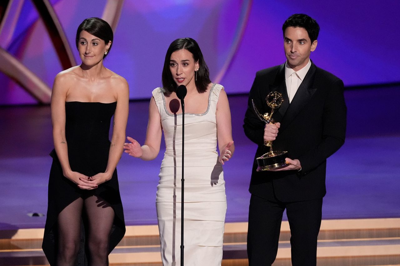 "Hacks" writers Jen Statsky, Lucia Aniello and Paul W. Downs accept the award for outstanding writing for a comedy series. 