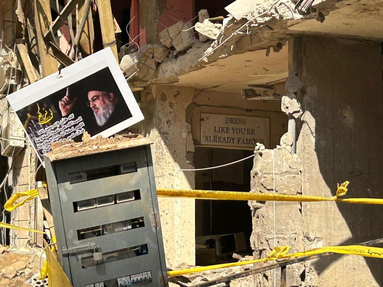 The damage in surrounding buildings reveal parts of homes and shops in southern Beirut. 