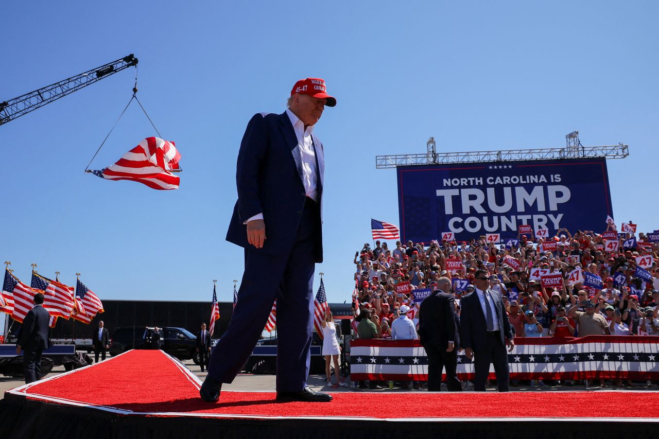 Former President Donald Trump takes the stage at a campaign rally in Wilmington, North Carolina, on September 21.