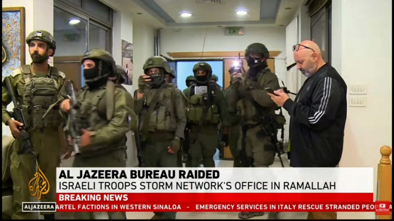 This screengrab from an Al Jazeera video shows IDF soldiers entering their office in Ramallah, West Bank on September 22. 