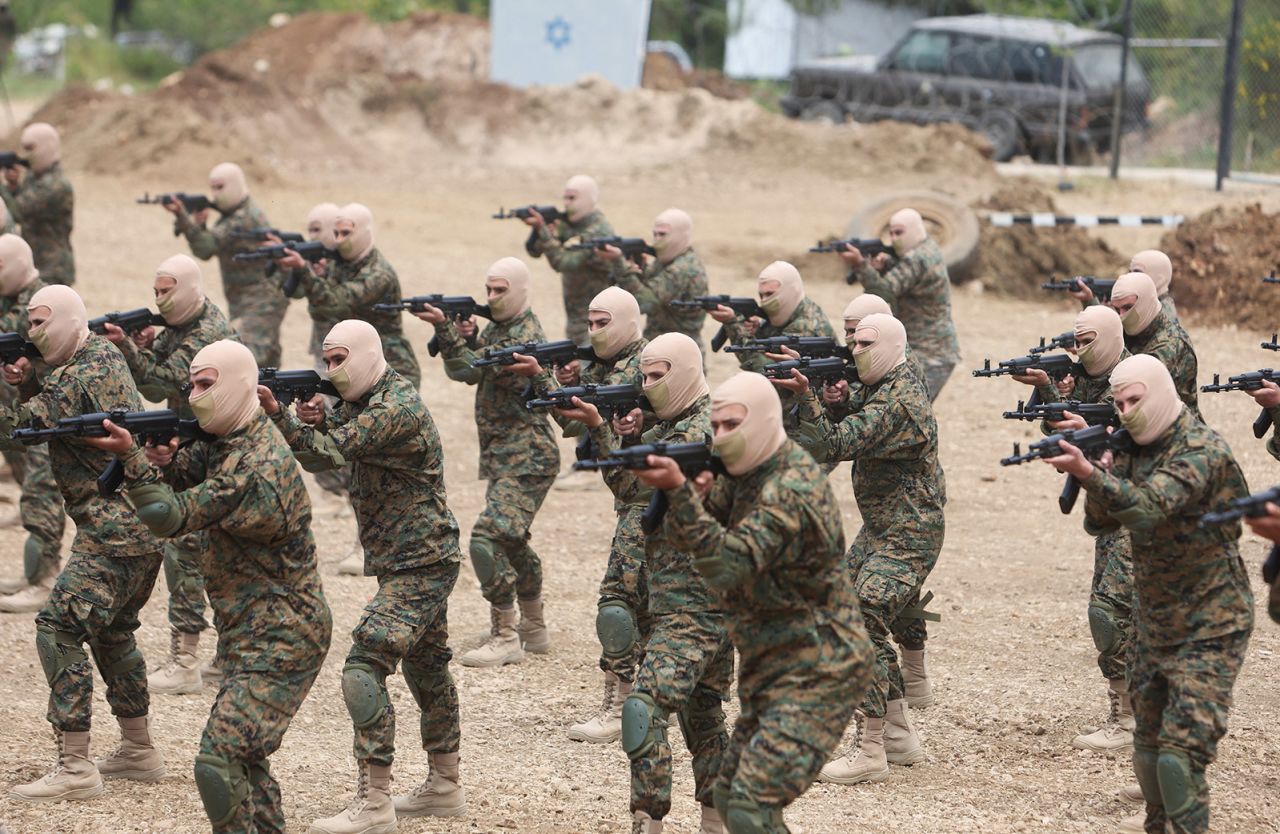 Hezbollah members take part in a military exercise during a media tour in Aaramta, Lebanon on May 21, 2023.