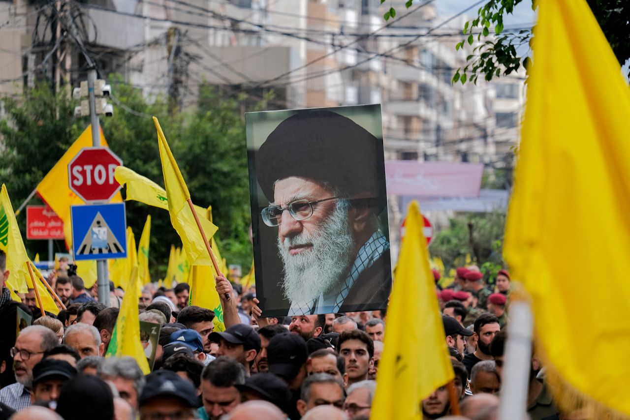 Hezbollah supporters follow the coffins at the funeral of Ibrahim Aqil, the Hezbollah Radwan Forces commander, and Mahmoud Hamad, another Hezbollah commander, both killed in an Israeli airstrike on a residential building in the southern suburb of Dahiyeh in Beirut, Lebanon on September 22.