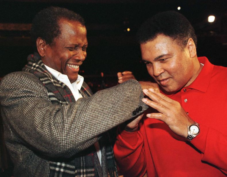 Poitier plays around with boxing legend Muhammad Ali at an ESPY Awards rehearsal in 1997. Poitier would present Ali with the Arthur Ashe Award for Courage.
