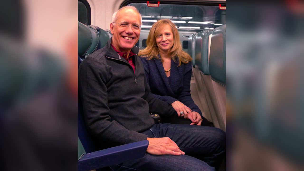 Here's McTwigan and Wenger on the Metro-North train on Christmas Day 2012, on the first anniversary of their meeting.
