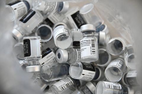 A photo shows empty bottles of Pfizer-BioNTech Covid-19 vaccine at the Emile Muller hospital in Mulhouse, eastern France, on January 8, 2021