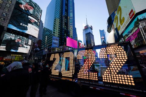 The 2022 sign that will be lit on top of a building on New Year's Eve is displayed in Times Square, New York, Monday, Dec. 20, 2021. 