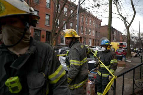 Firefighters at the scene of a deadly fire on Wednesday.