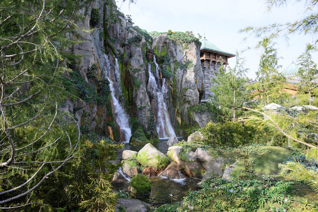 Fantasy Springs is surrounded by waterfalls and greenery that weave together stories from three Disney franchises.