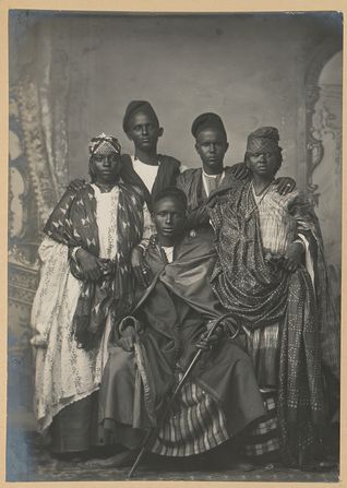 “Groupe d’Oilofs Sénégalais à St-Louis,” by Emile Noal, c.1890–1900. “Oilof” is an old spelling for Wolof, a Senegalese ethnic group. The subjects of this group portrait are unknown, a common occurrence with old photographs from Senegal, although Paoletti’s research has been able to finally attribute names to some images.