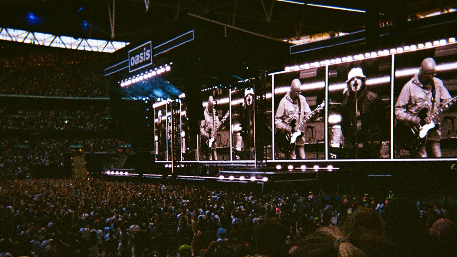 Oasis Fans Set Beer Record at Wembley: A Cultural Commentary