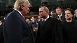 President Donald Trump talks with Supreme Court Chief Justice John Roberts as Associate Justice Elena Kagan looks on before the State of the Union address in the House chamber on February 4, 2020 in Washington, DC.