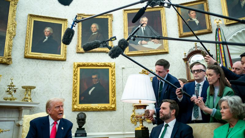 Flags, figurines and gold everywhere: Trump transforms the Oval Office into a gilded gallery