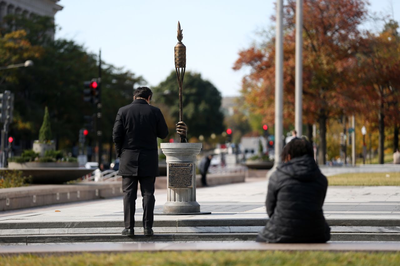 A tiki torch statue called “The Donald J. Trump Enduring Flame” at Freedom Plaza in Washington, DC, on Tuesday, October 29, 2024.