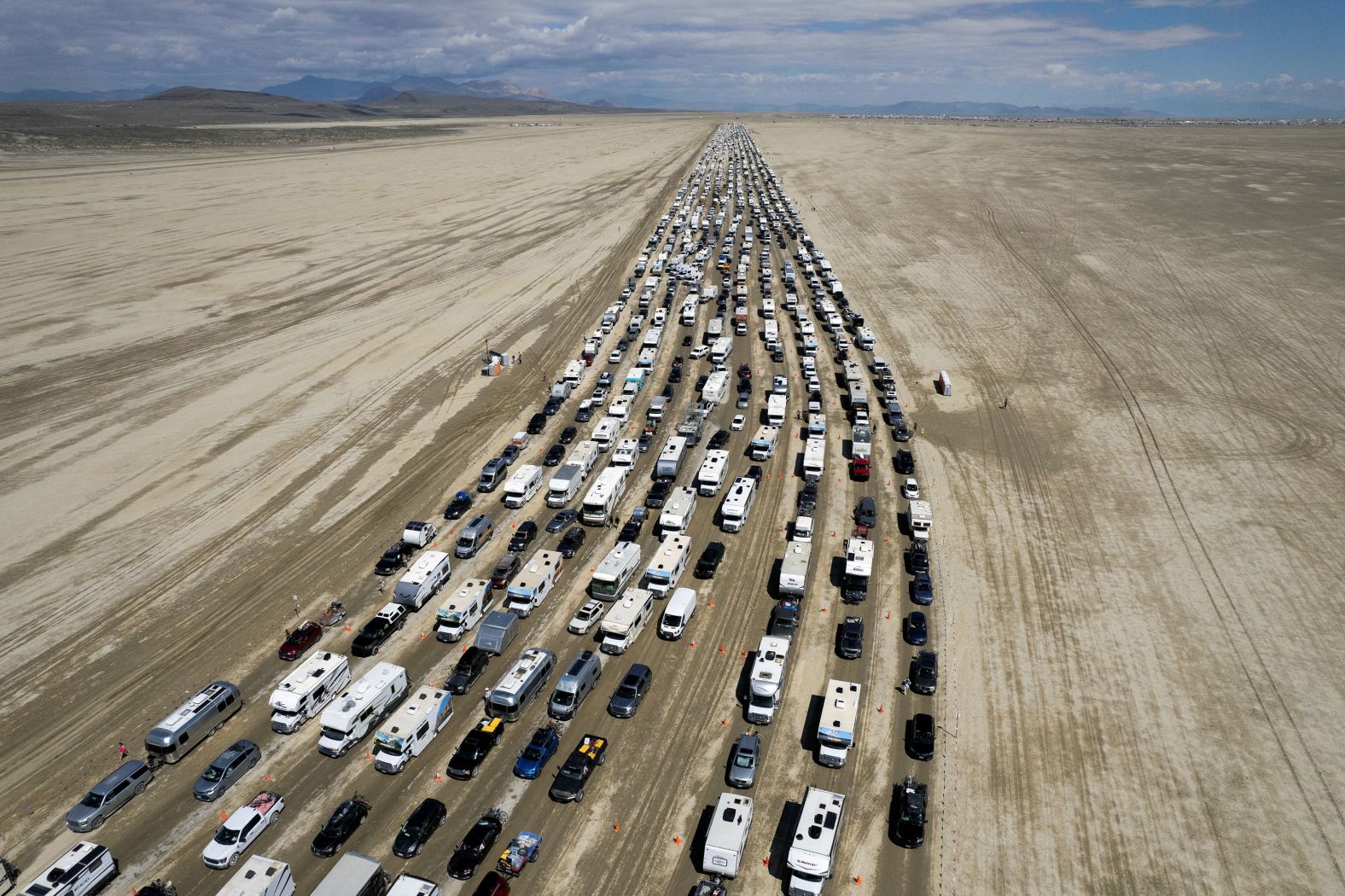 Vehicles leave the Burning Man festival in Nevada’s Black Rock Desert on Monday, September 4. Thousands of Burning Man attendees <a href="https://www.cnn.com/2023/09/05/us/burning-man-storms-shelter-exodus-tuesday/index.html">made their mass exodus</a> after intense rain over the weekend flooded camp sites and filled them with thick mud. More than 70,000 people were stranded as they waited for the area to dry out.