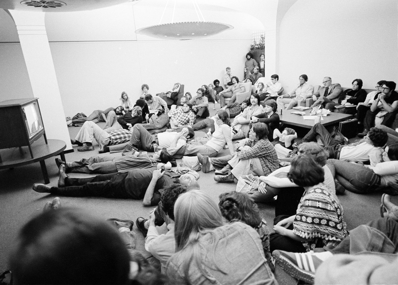 Students at the State University of New York at Albany crowd a dormitory lounge to watch a presidential debate between Jimmy Carter and President Gerald Ford in 1976. The Carter-Ford debates were the first since Kennedy-Nixon.