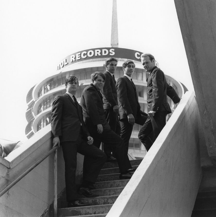 The Beach Boys stand near the Capitol Records building in Los Angeles in 1992. From left are Brian Wilson, Carl Wilson, Dennis Wilson, Marks and Love.