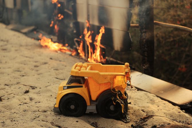 A children's sandbox burns as the Franklin Fire grows in Malibu on Tuesday.