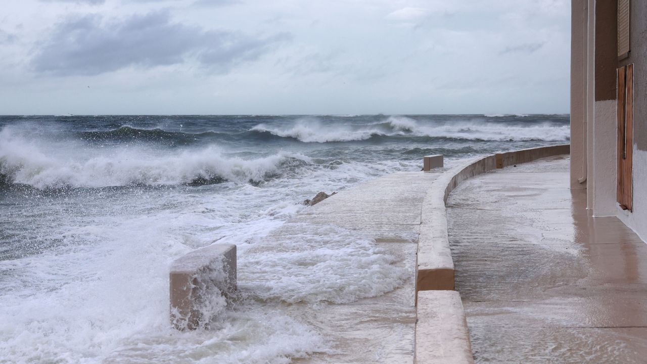 Waves from the Gulf of Mexico crash on the shore in St. Pete Beach, Florida.