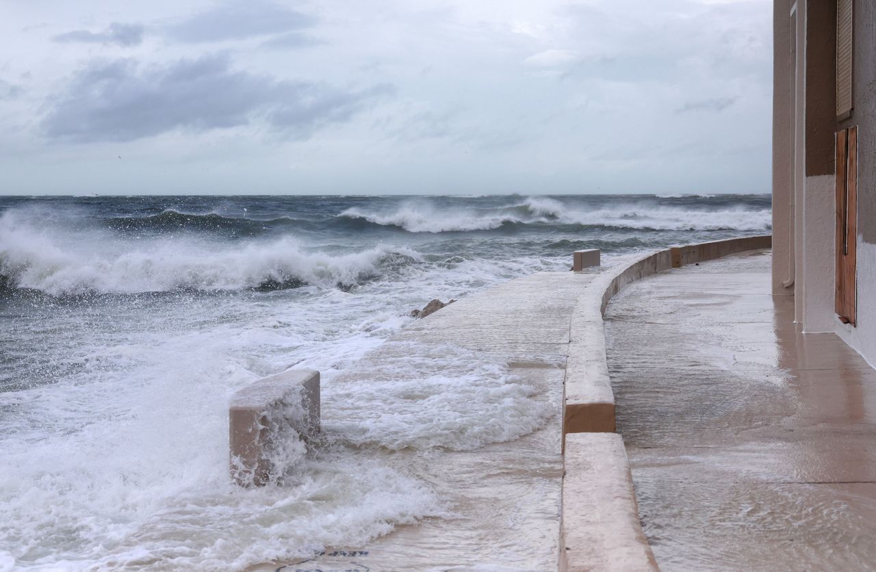 Waves from the Gulf of Mexico crash on the shore in St. Pete Beach, Florida.