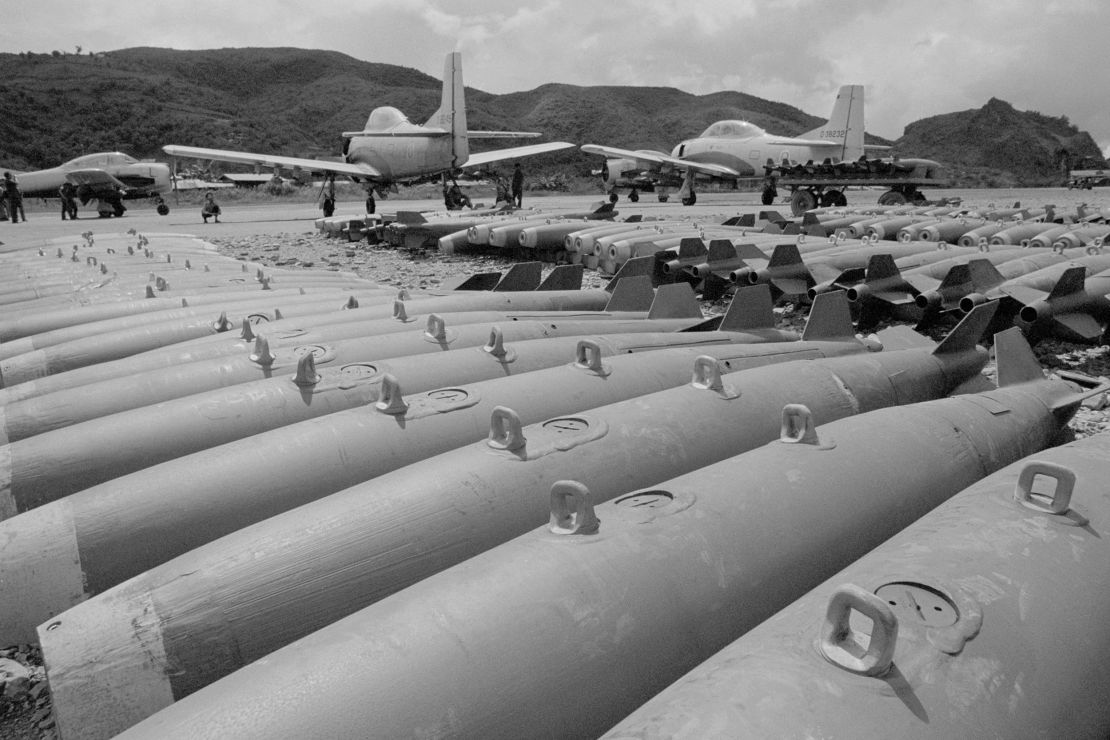 In this image taken in 1972, converted T-28 trainer aircraft stand near 250-pound bombs, part of the air arm of the CIA-sponsored "Secret Army" in Long Tieng, Laos.