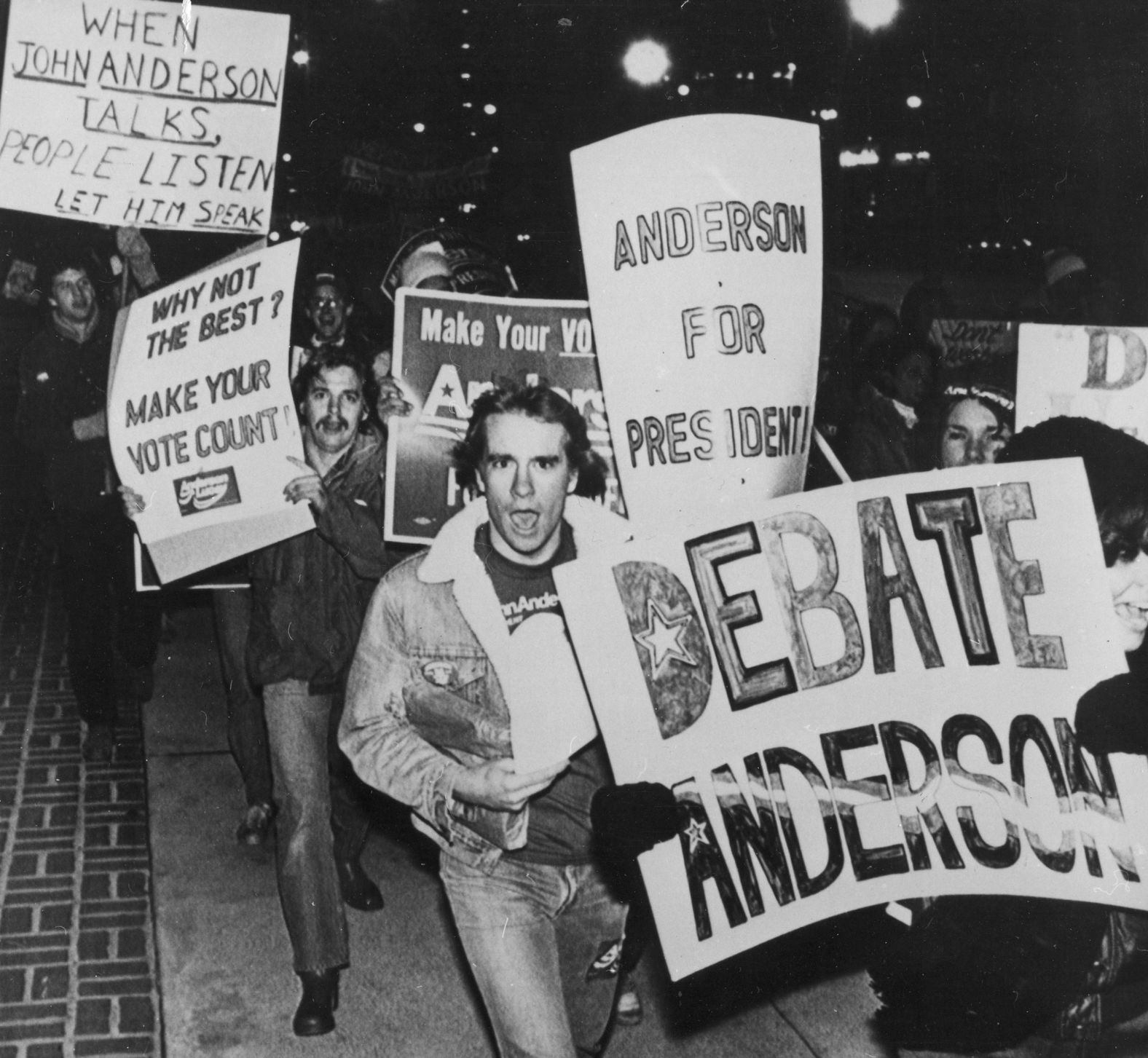Supporters of independent candidate John B. Anderson march outside the Cleveland Convention Center in 1980, protesting the debate between President Jimmy Carter and Ronald Reagan because Anderson was not invited. Anderson had taken part in an earlier debate with the two men.