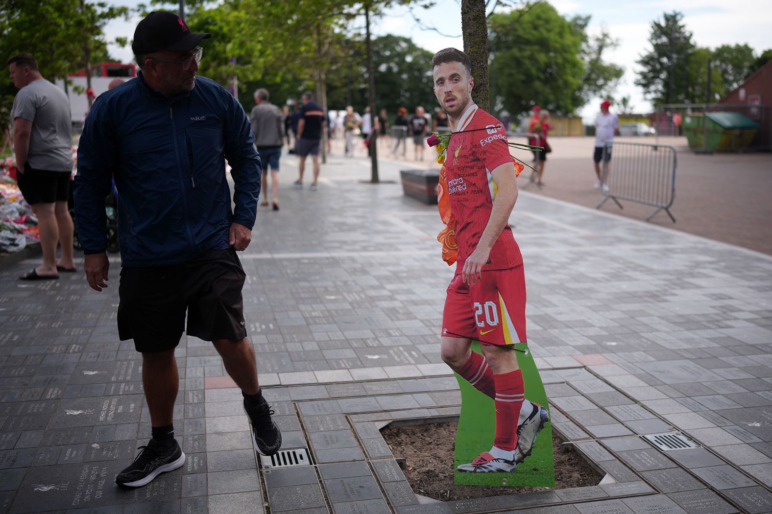 A life-size photo of Jota is seen outside Liverpool’s stadium, Anfield, on Friday.
