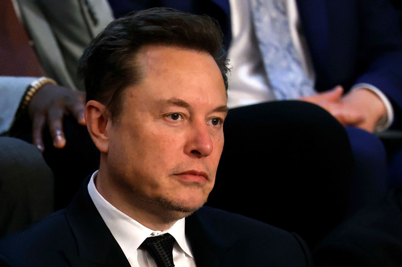 Tesla CEO Elon Musk listens as Israeli Prime Minister Benjamin Netanyahu addresses a joint meeting of Congress in the chamber of the House of Representatives at the U.S. Capitol on July 24 in Washington, DC.?