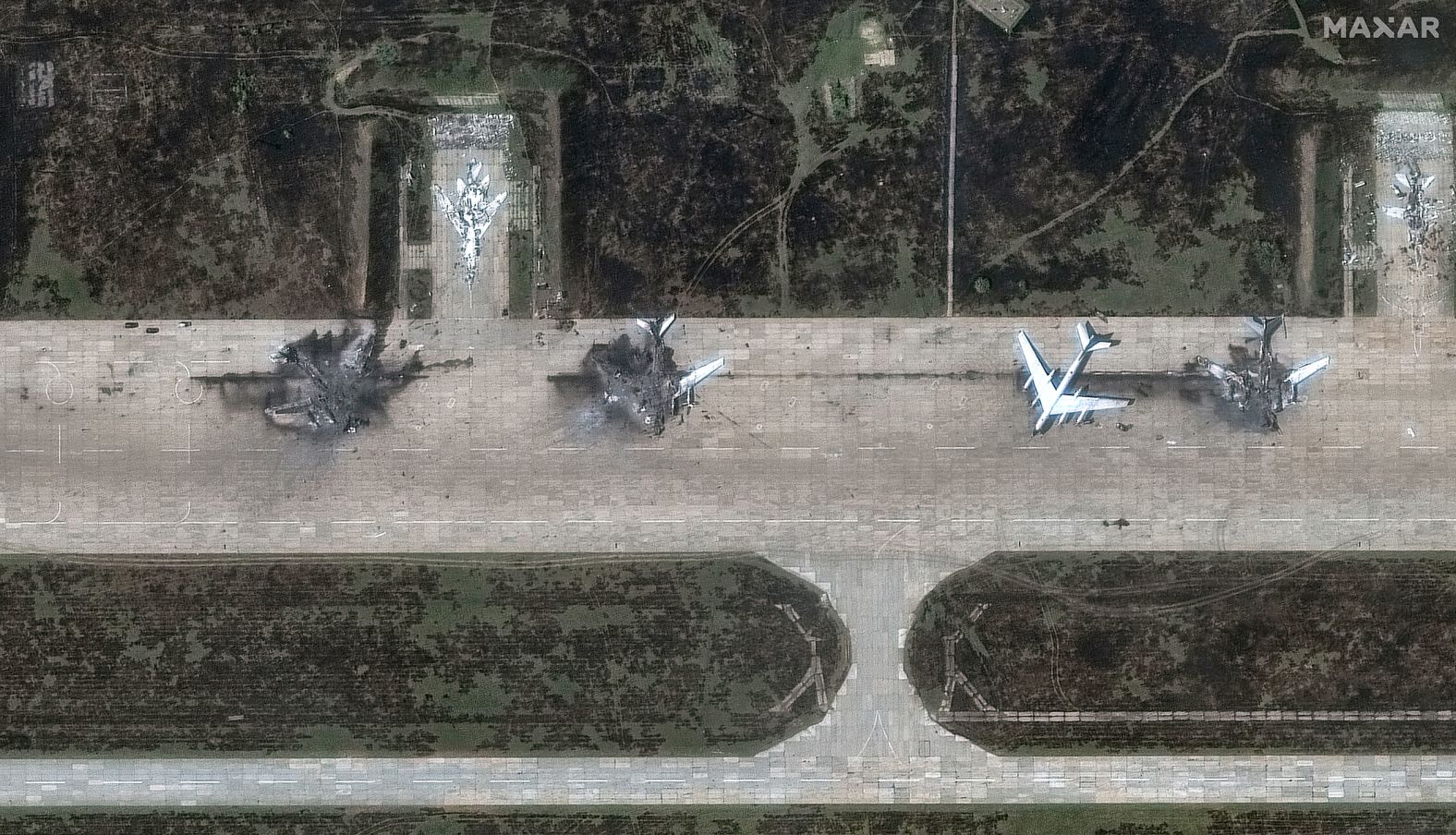 This satellite image, taken on Wednesday, June 4, shows destroyed aircraft at an air base in Russia’s Irkutsk region. <a href="index.php?page=&url=https%3A%2F%2Fwww.cnn.com%2F2025%2F06%2F01%2Feurope%2Fukraine-drones-russia-airbases-intl">Ukrainian forces destroyed dozens of Russian warplanes</a> parked at air bases thousands of miles from the front lines, according to a source in the country’s security services.