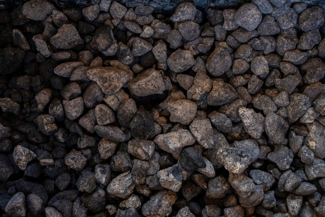 Polymetallic nodules collected by The Metals Company from the Clarion-Clipperton Zone are displayed on a ship in San Diego, California, in 2021.