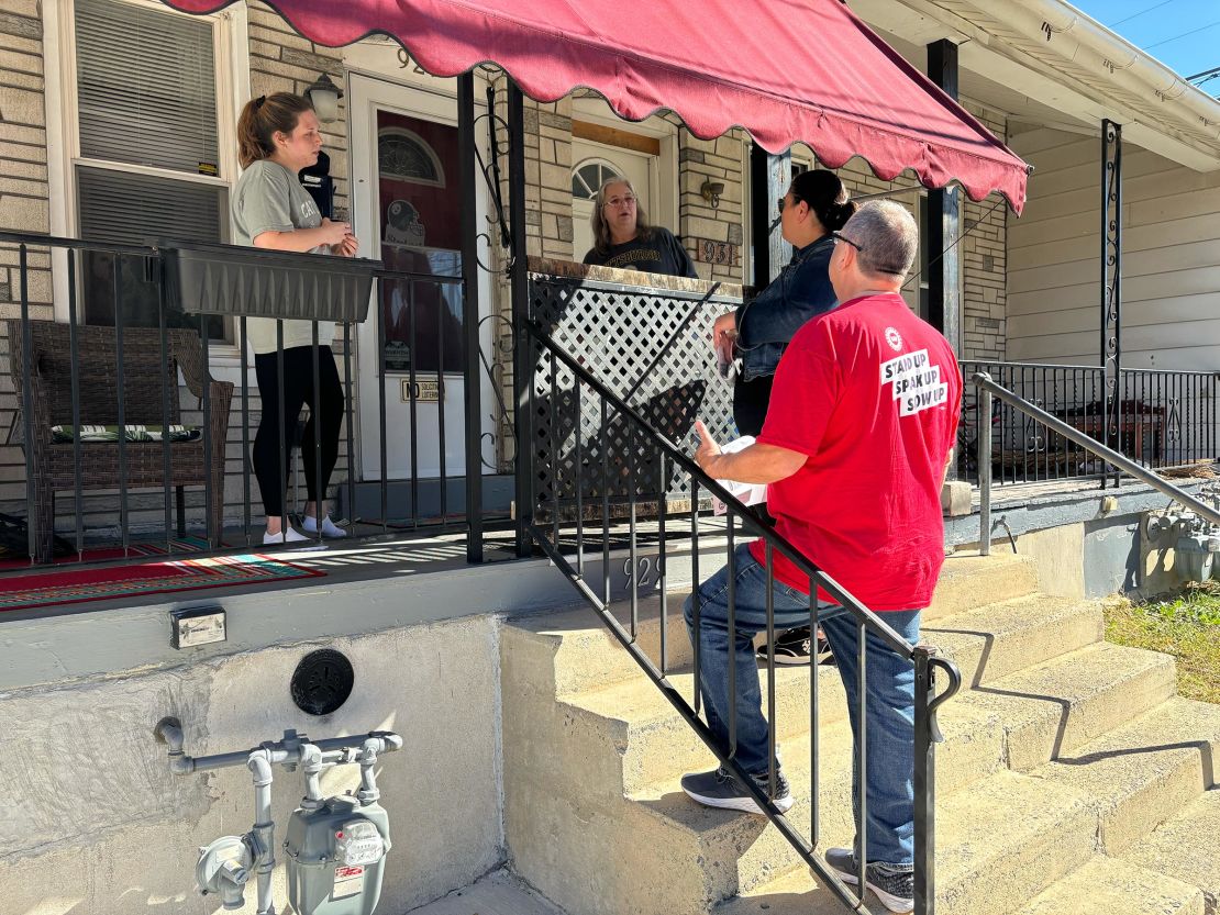 Pennsylvania AFL-CIO President Angela Ferritto and UAW Local 644 President Jim Hutchinson speak to Cheyenne Lazarus and Cindy Lazarus knocking on Democratic Party doors in the Allentown, Pennsylvania area on October 20th.