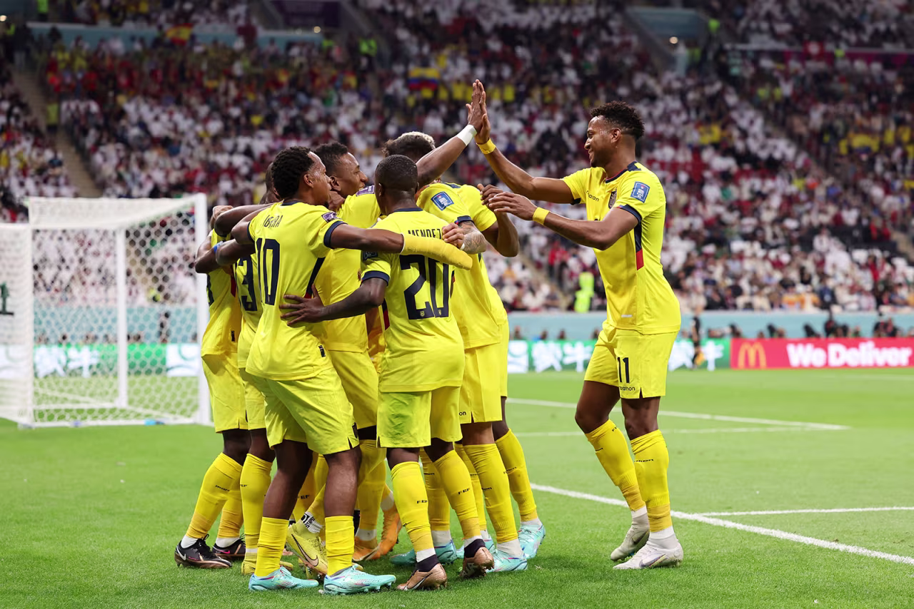 Ecuador celebrates after Enner Valencia scored on a penalty kick in the first half.