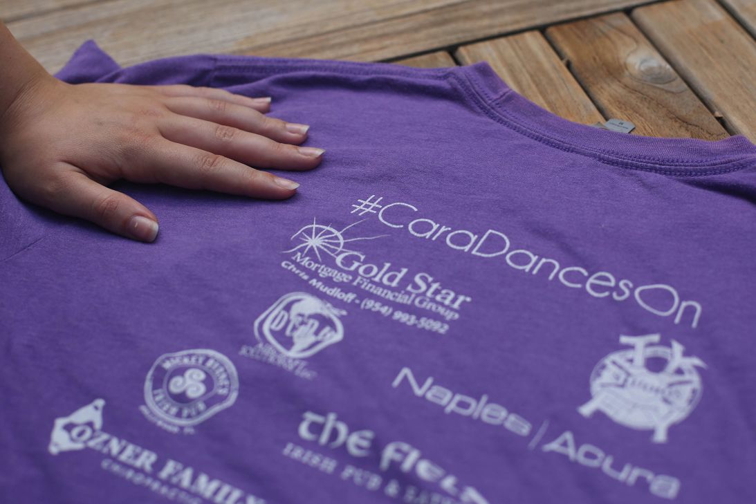 Canty shows a dance shirt memorializing 14-year-old Cara Loughran, who was one of Parkland, Florida, shooting victims.