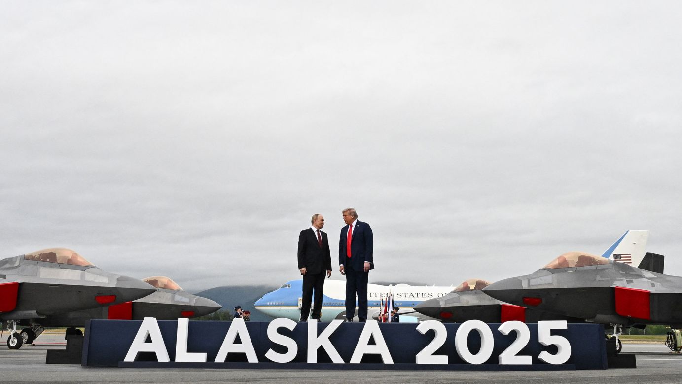 US President Donald Trump and Russian President Vladimir Putin pose on the tarmac after arriving at Joint Base Elmendorf-Richardson in Anchorage, Alaska, on Friday.