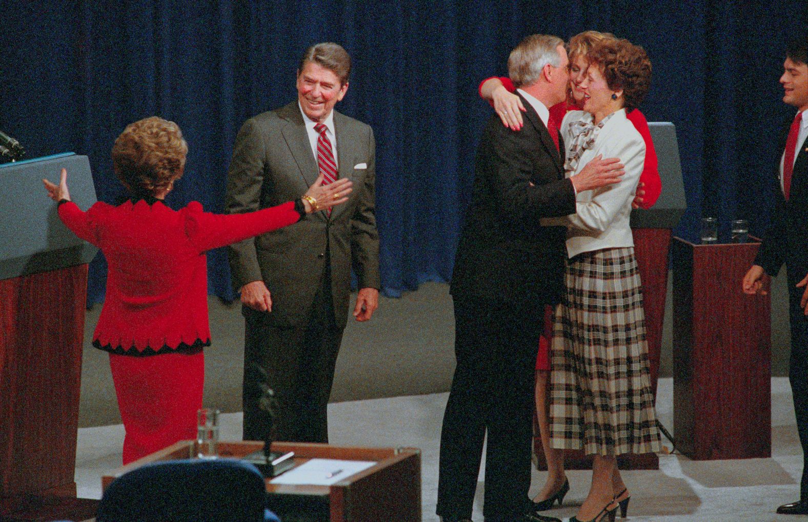 Reagan and his 1984 challenger, Walter Mondale, are congratulated by family members after their second presidential debate.