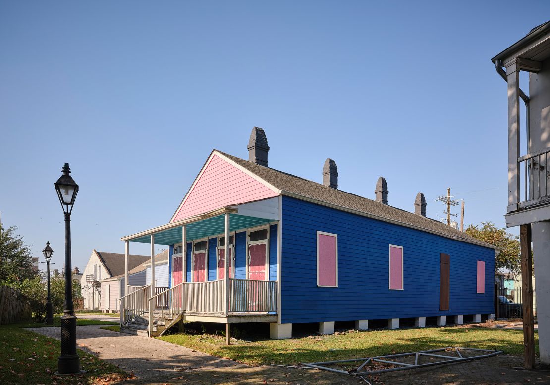 A shotgun-style house at NOAAM that was known for its pink exterior is now a mix of pink and blue.