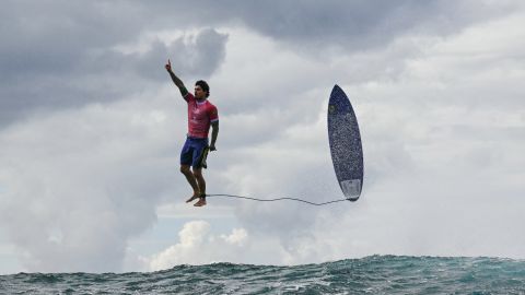 TOPSHOT - Brazil's Gabriel Medina reacts after getting a large wave in the 5th heat of the men's surfing round 3, during the Paris 2024 Olympic Games, in Teahupo'o, on the French Polynesian Island of Tahiti, on July 29, 2024. (Photo by Jerome BROUILLET / AFP) (Photo by JEROME BROUILLET/AFP via Getty Images)