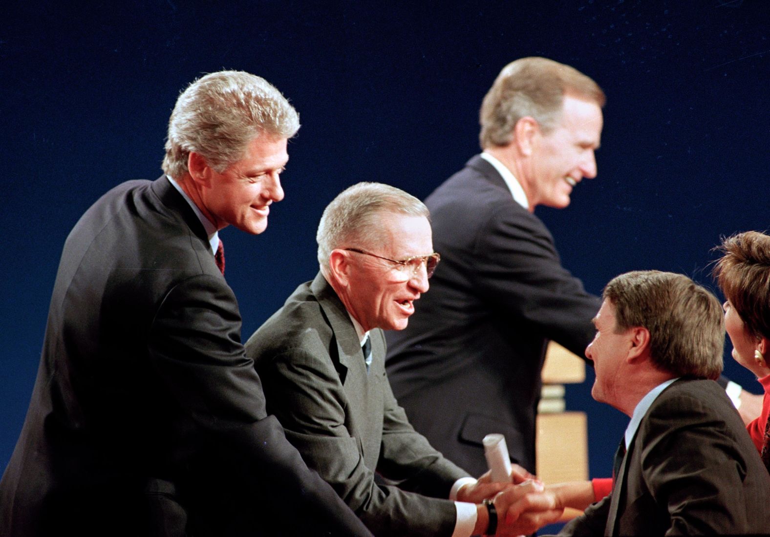 Clinton shakes hand with PBS debate moderator Jim Lehrer following a debate with President George H.W. Bush and independent candidate H. Ross Perot in October 1992. It was their third and final debate.
