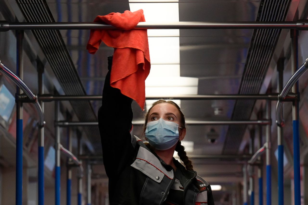 An employee disinfects a metro train to prevent coronavirus spread, at a Moscow depot on October 22.