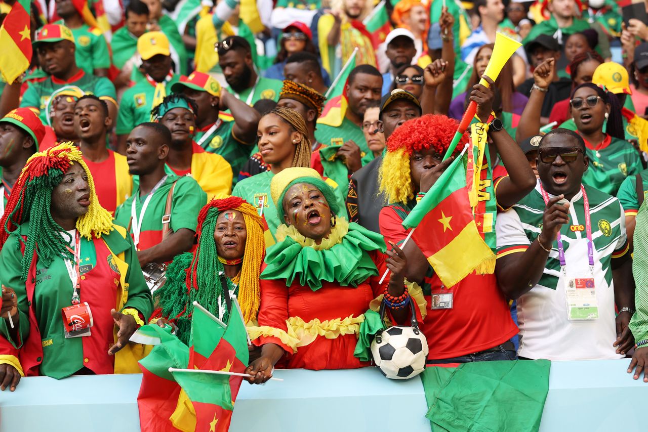 Cameroon fans enjoy the pre-match atmosphere at the Al Janoub Stadium.