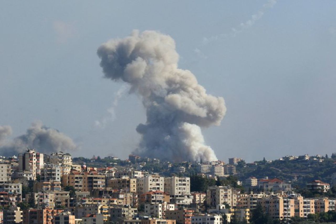 Smoke billows from a site targeted by Israeli shelling in the southern Lebanese village of Zaita on September 23.