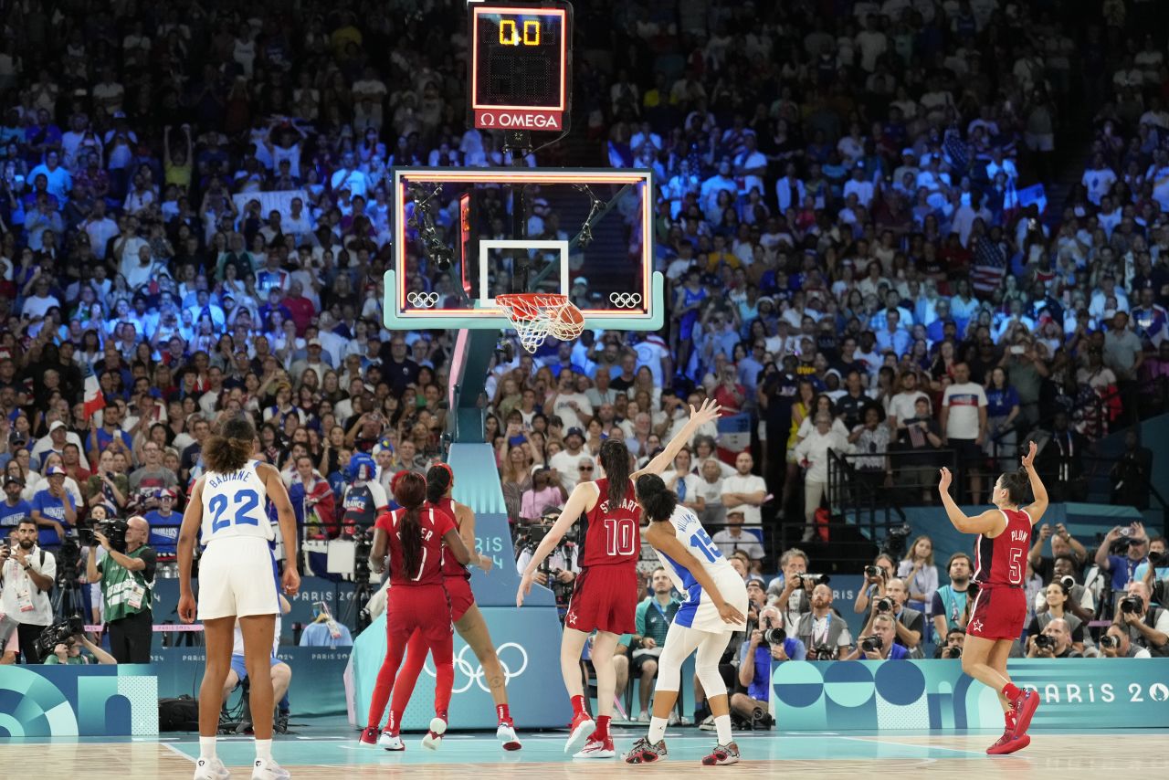 French basketball player Gabby Williams makes a two-point basket at the end of a game against the United States on August 11.