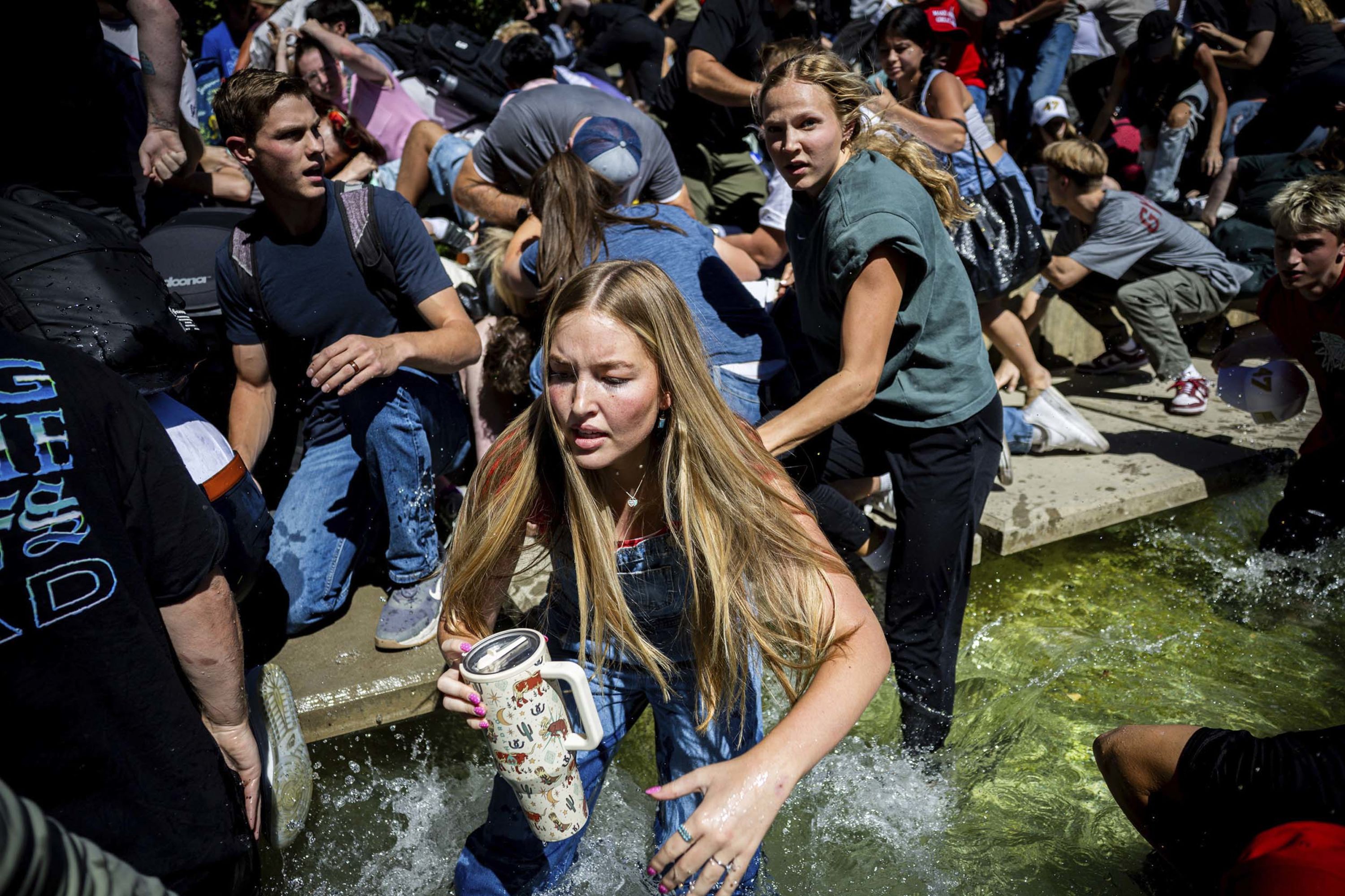 People react after conservative activist Charlie Kirk was shot at Utah Valley University in Orem, Utah, on Wednesday, September 10.